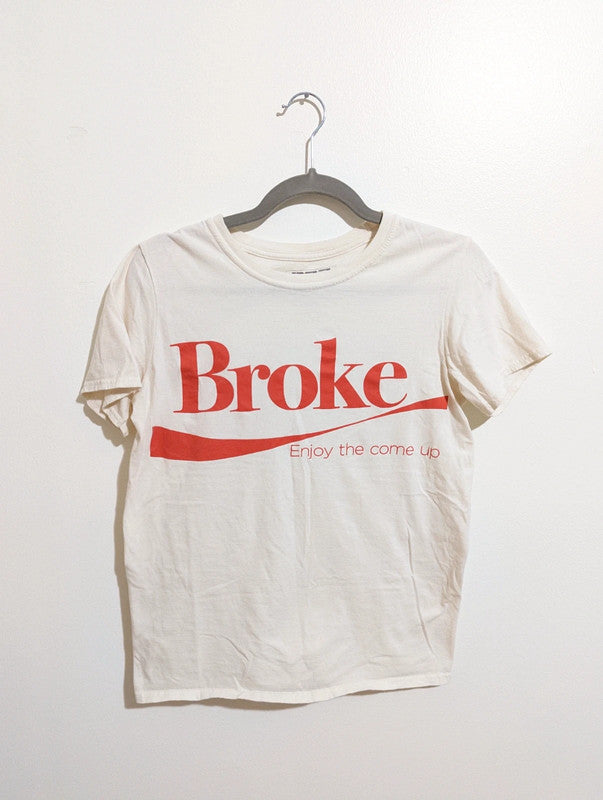 Cream short sleeve t-shirt with "Broke, enjoy the come up" graphic.

Brand
Broke Paid Rich

Material
100% cotton

Measurements
Men's Small
*for exact dimensions please refer to photos